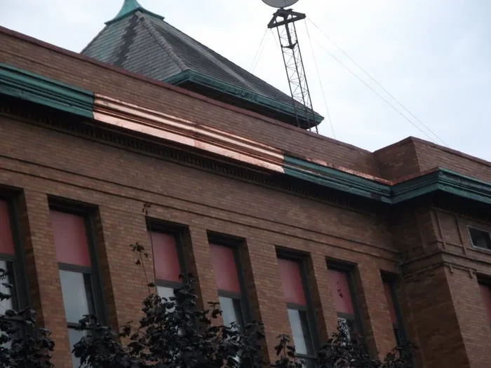 Slide of Raincoat Roofing