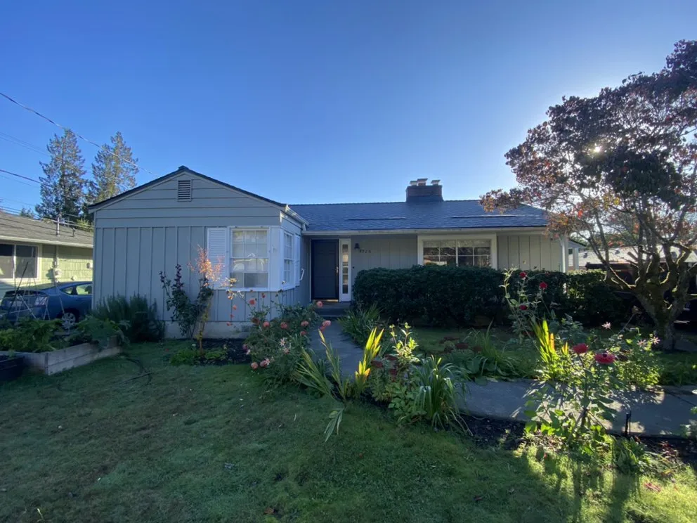 Slide of Rainier Roofing Company