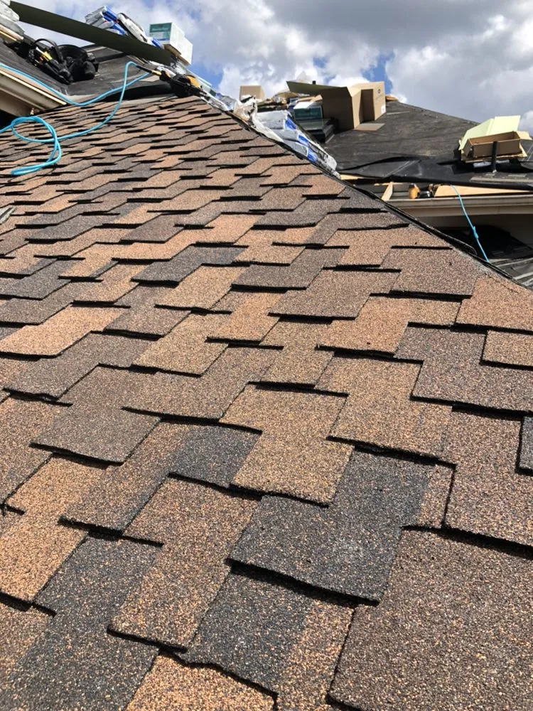 Slide of Rainier Roofing Company