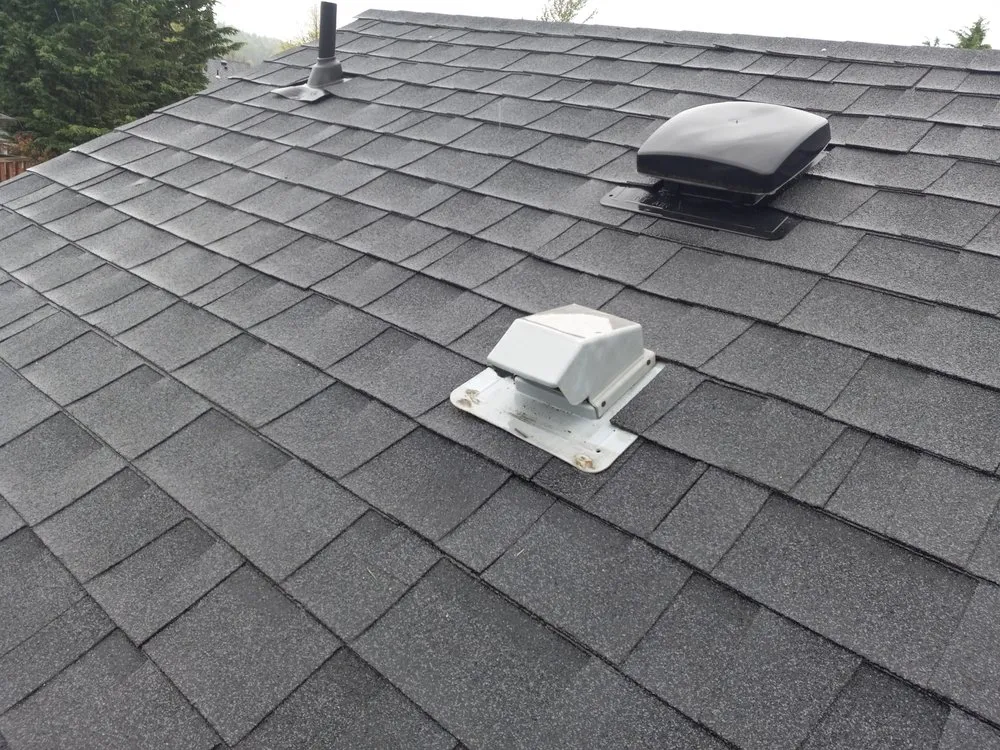 Slide of Rainman Roof Services