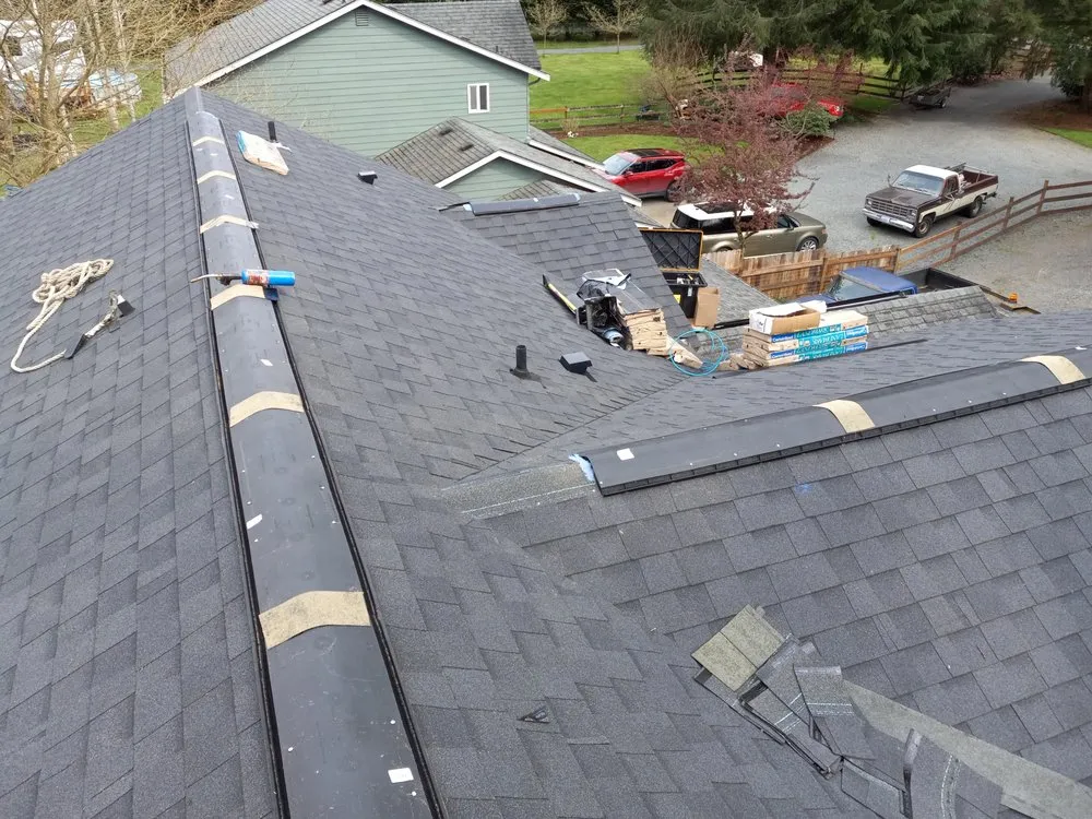 Slide of Rainman Roof Services