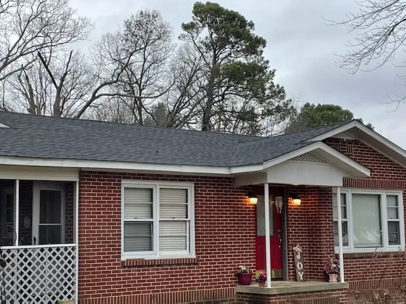 Slide of RainMan Roofing and Restoration