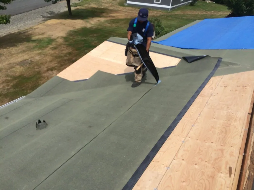 Slide of Rainshield Roofing & Construction