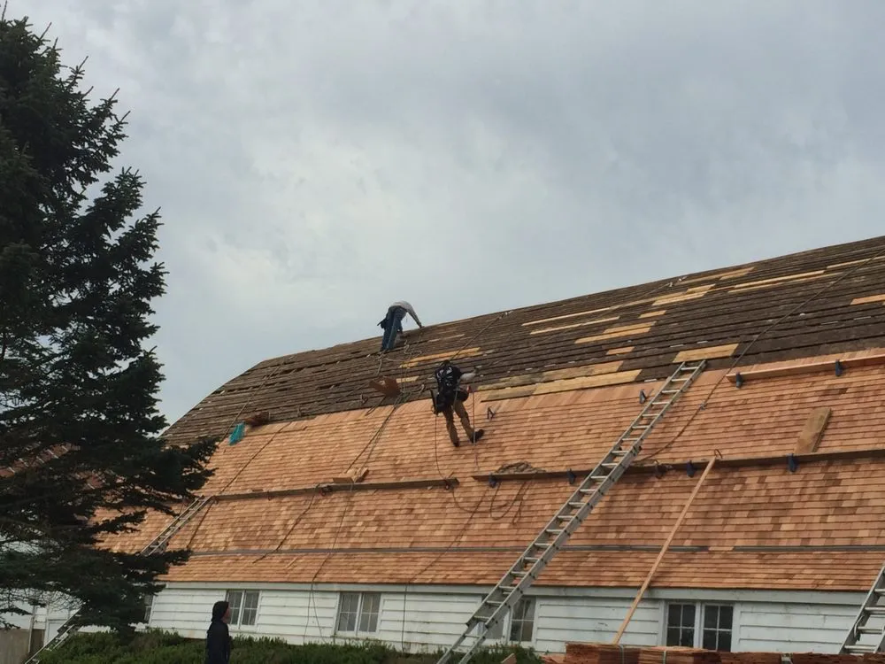 Slide of Rainshield Roofing & Construction