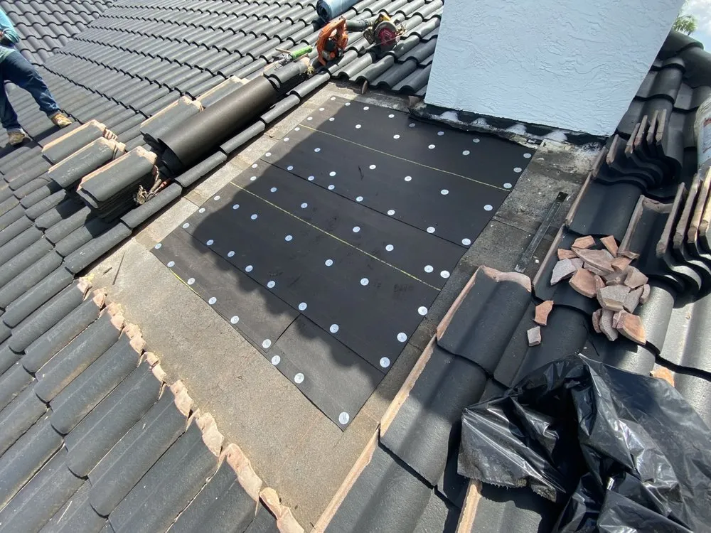 Slide of RainShield Roofing