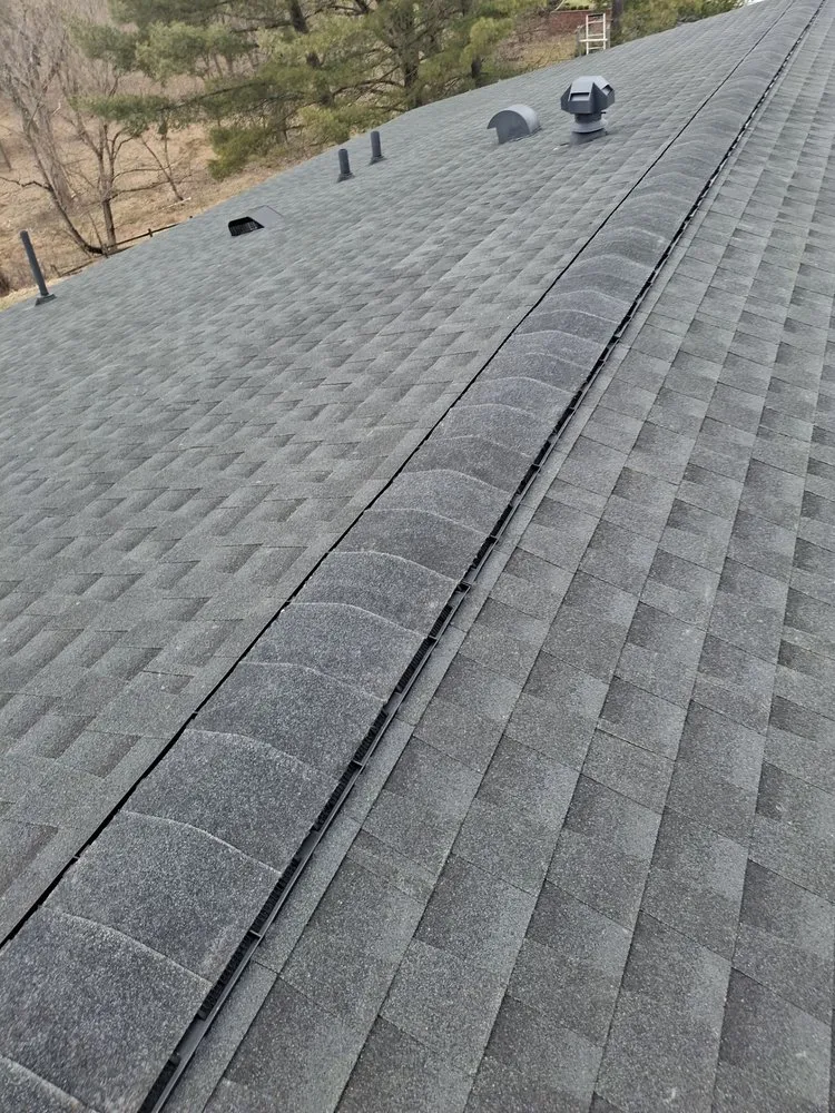 Slide of Rainstoppers Roofing