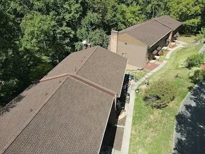 Slide of Rainstoppers Roofing