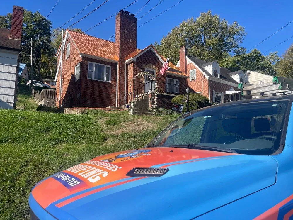 Slide of Rainstoppers Roofing