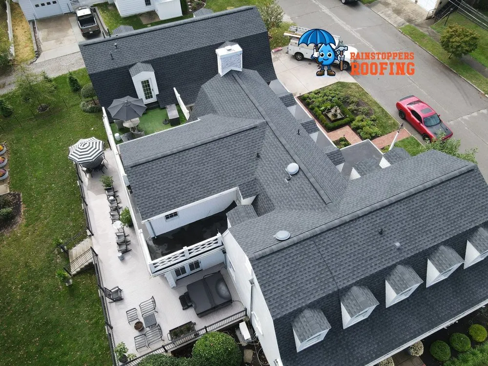 Slide of Rainstoppers Roofing