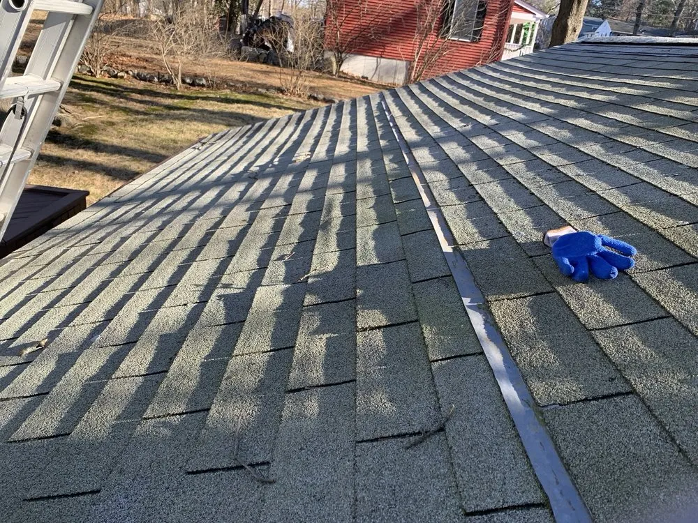 Slide of Rainstorm Roofing And Siding