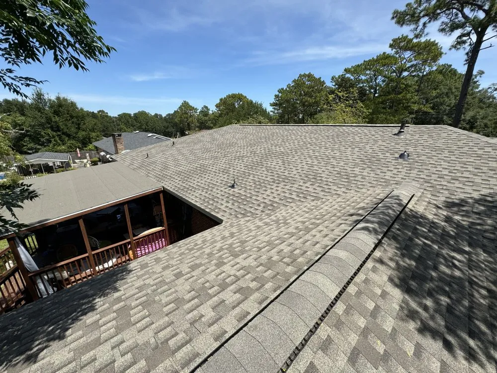 Slide of RainTight Roofing & Construction