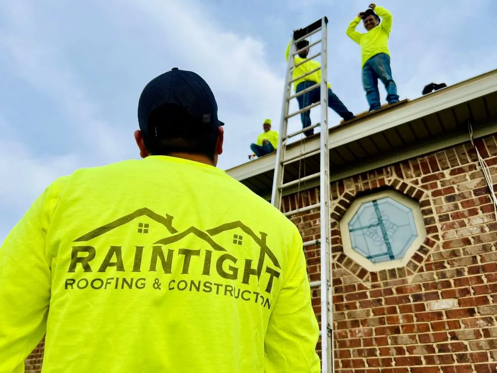Slide of RainTight Roofing & Construction