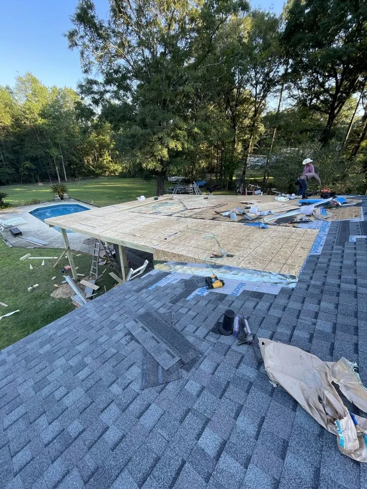 Slide of RainTight Roofing & Construction