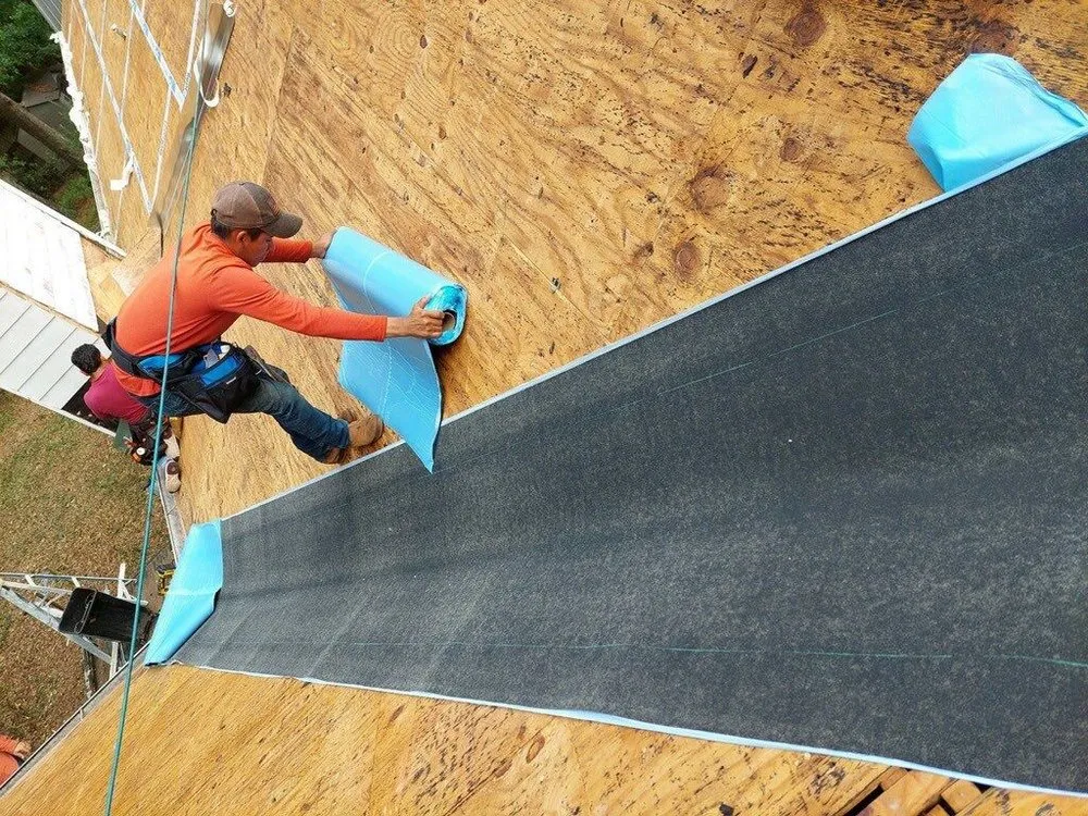 Slide of RainTight Roofing & Construction