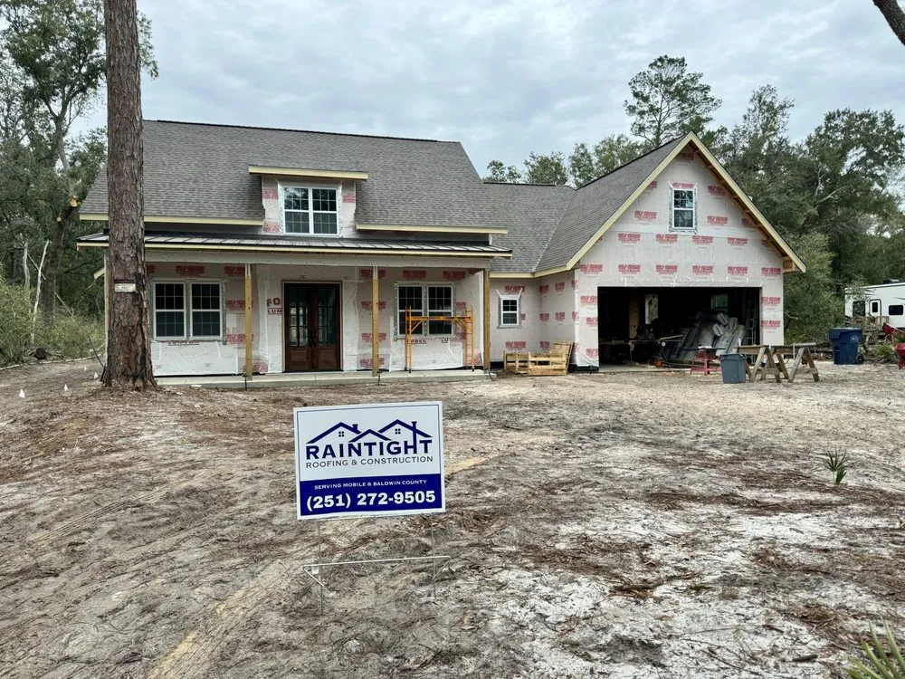 Slide of RainTight Roofing & Construction