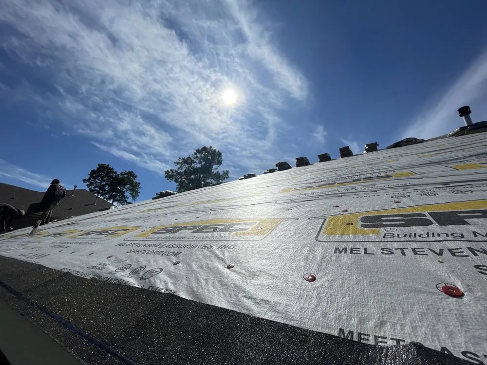 Slide of RainTight Roofing & Construction