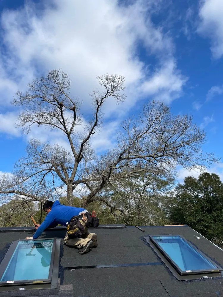 Slide of RainTight Roofing & Construction