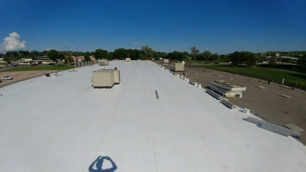 Slide of RainTite Roofing & Construction