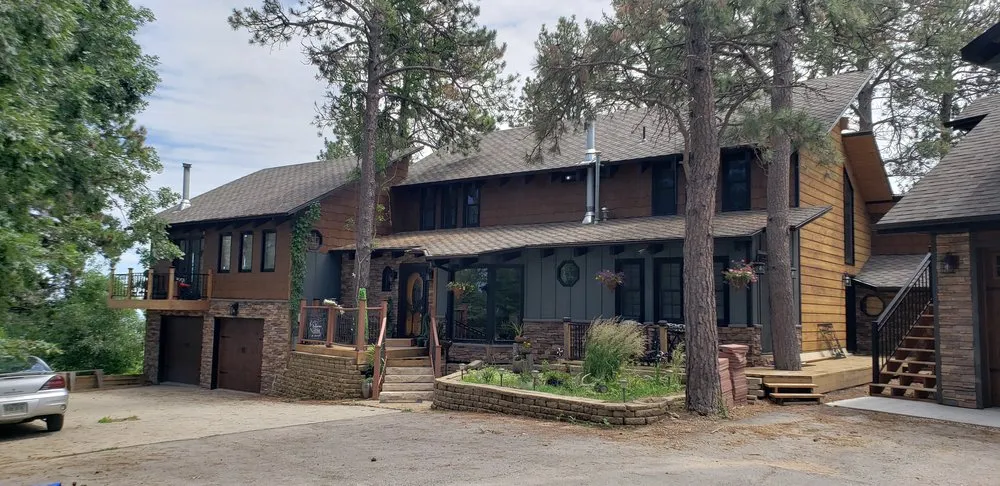 Slide of RainTite Roofing & Construction