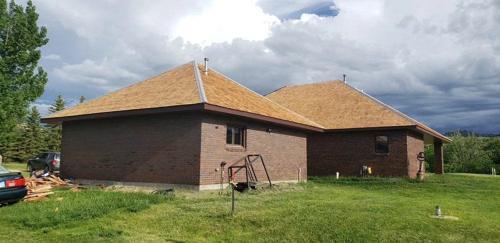 Slide of RainTite Roofing & Construction