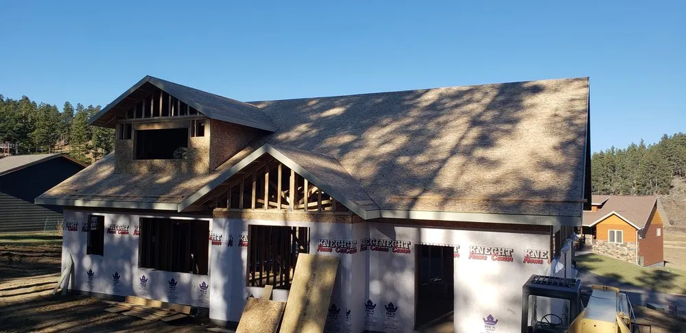 Slide of RainTite Roofing & Construction