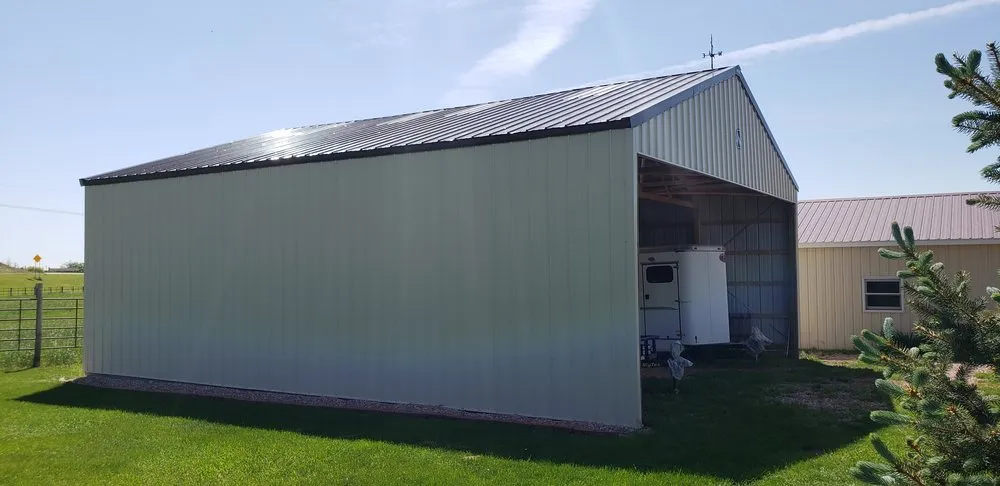 Slide of RainTite Roofing & Construction