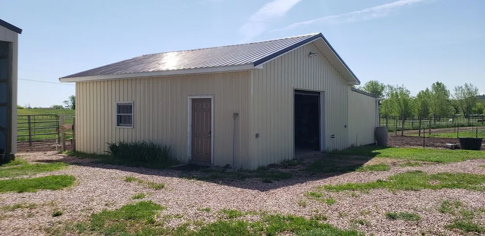 Slide of RainTite Roofing & Construction