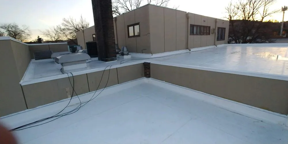 Slide of RainTite Roofing & Construction