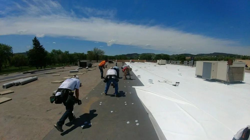 Slide of RainTite Roofing & Construction