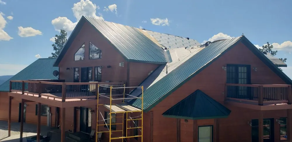 Slide of RainTite Roofing & Construction