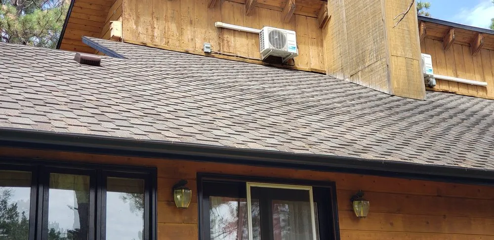 Slide of RainTite Roofing & Construction