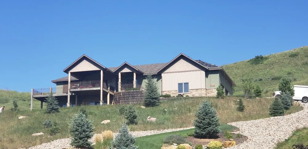 Slide of RainTite Roofing & Construction