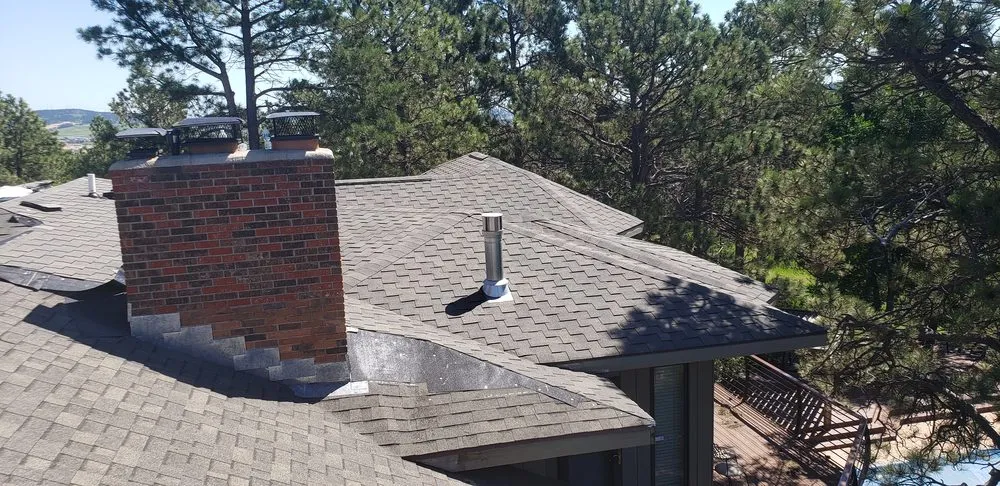 Slide of RainTite Roofing & Construction