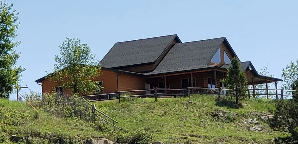 Slide of RainTite Roofing & Construction