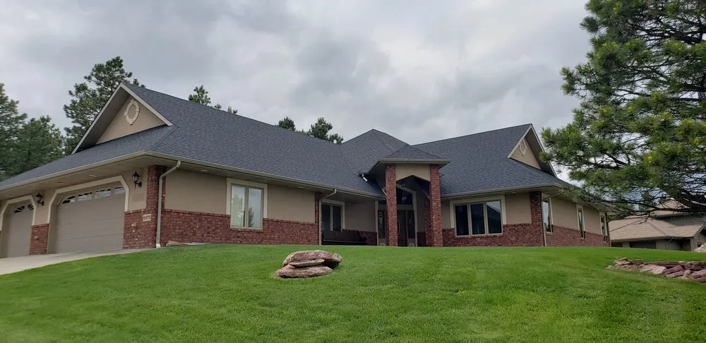 Slide of RainTite Roofing & Construction