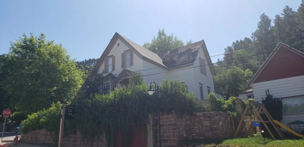 Slide of RainTite Roofing & Construction