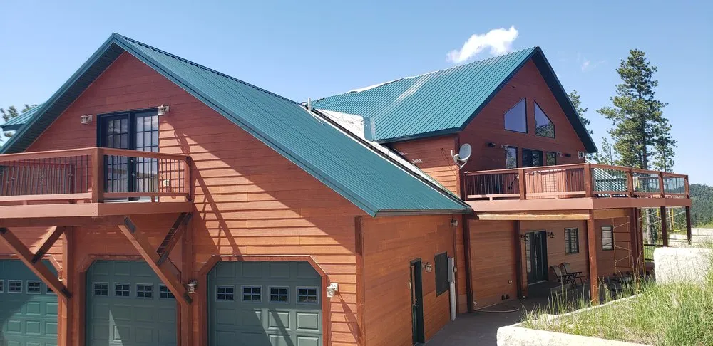 Slide of RainTite Roofing & Construction