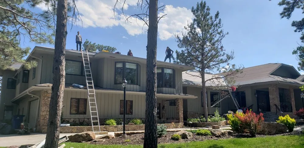 Slide of RainTite Roofing & Construction