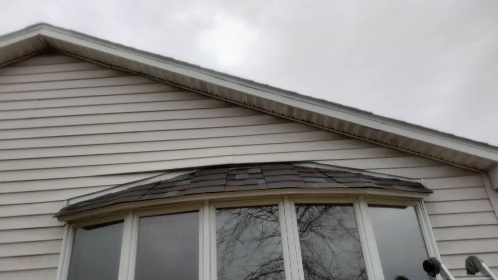 Slide of Rainwaters Roofing