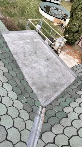 Slide of Rainwaters Roofing