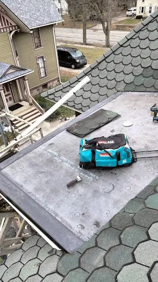 Slide of Rainwaters Roofing