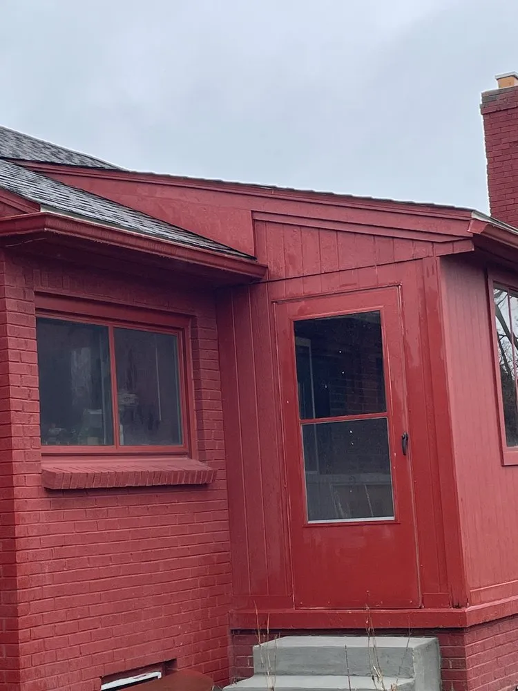 Slide of Rainwaters Roofing