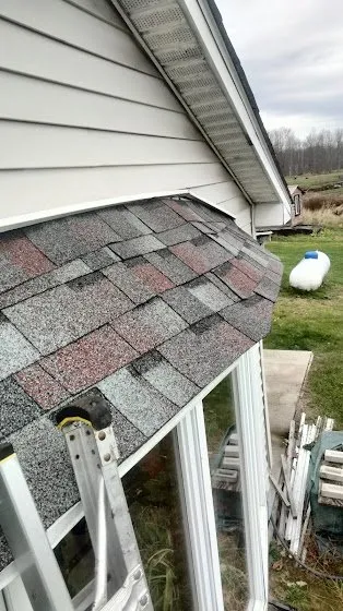 Slide of Rainwaters Roofing