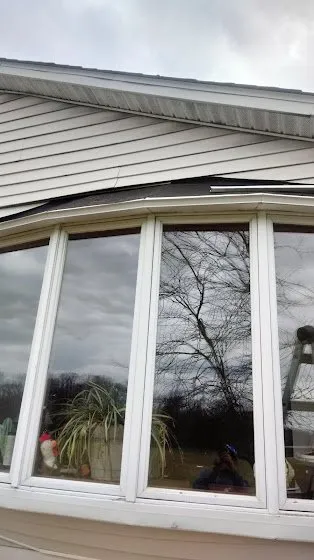 Slide of Rainwaters Roofing