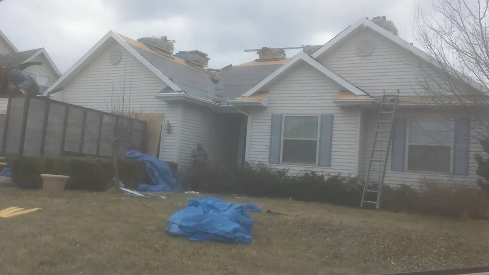 Slide of Rainwaters Roofing