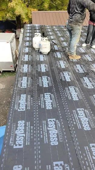 Slide of Rainwaters Roofing