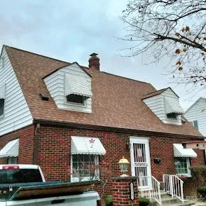 Slide of Rainwaters Roofing