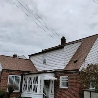 Slide of Rainwaters Roofing