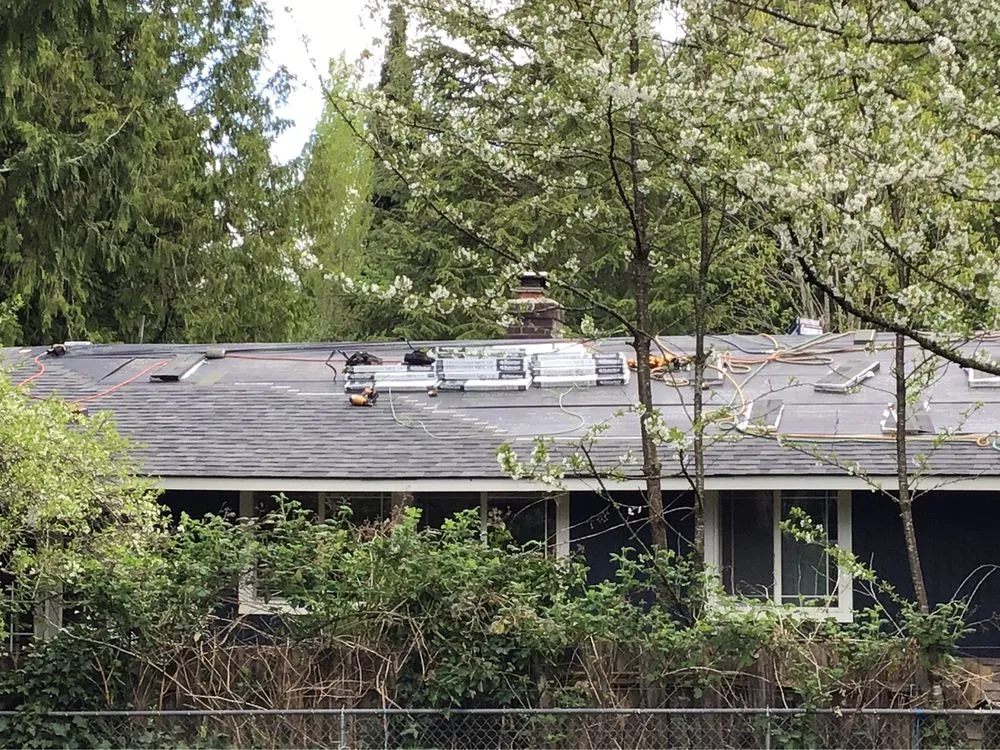 Slide of Rainy City Roofing