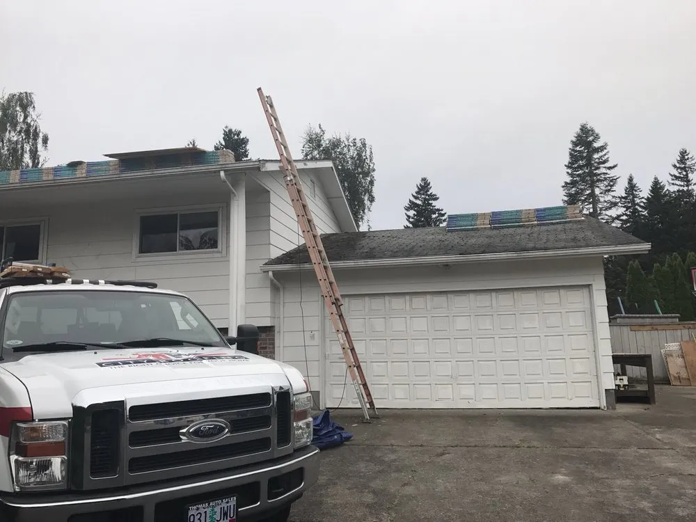 Slide of Rainy City Roofing